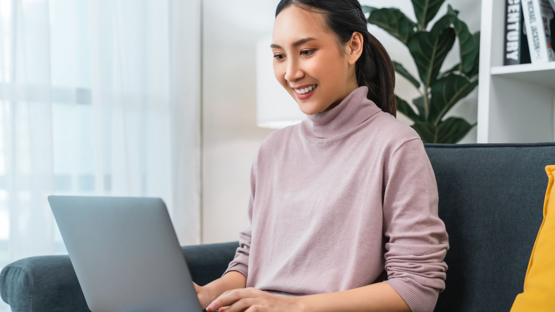 A woman using a laptop