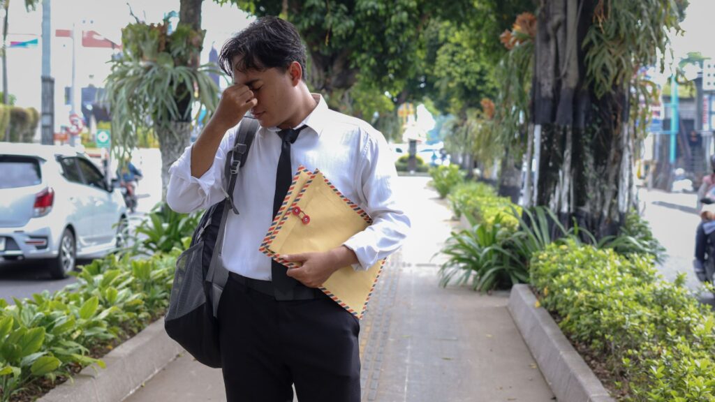 A man holding a customer service resume